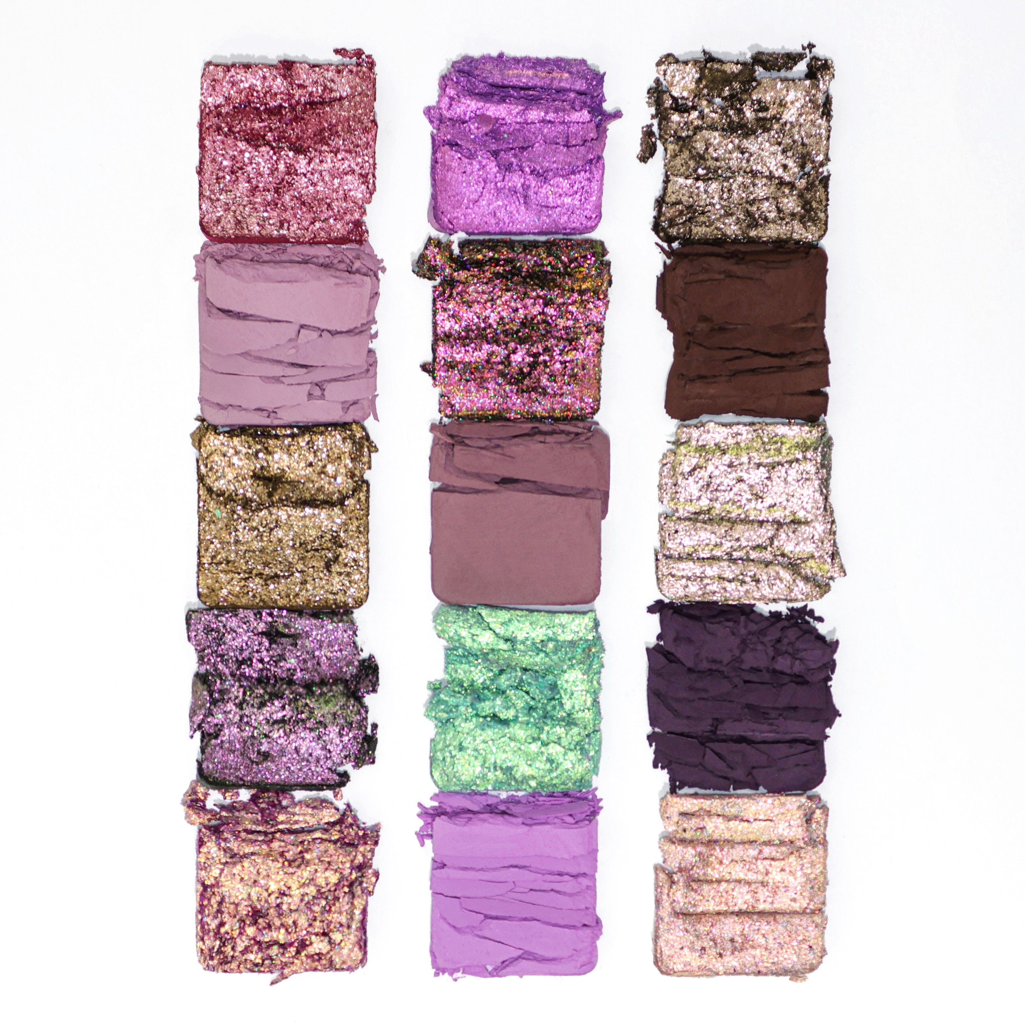 Collection of colorful glittery makeup shades of Minka by Adept Cosmetics arranged in a grid on a white background