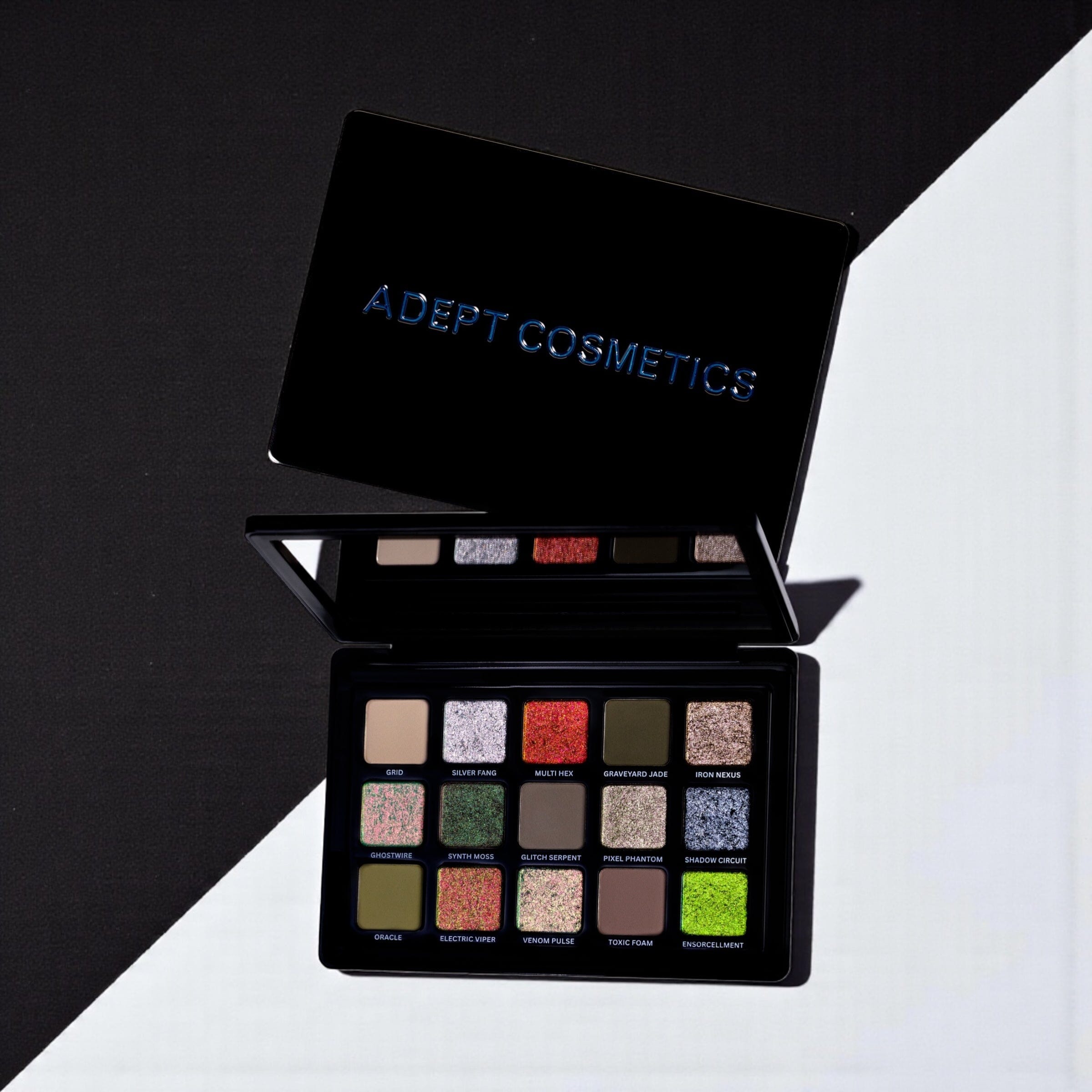 Adept Cosmetics eyeshadow palette on a black and white background