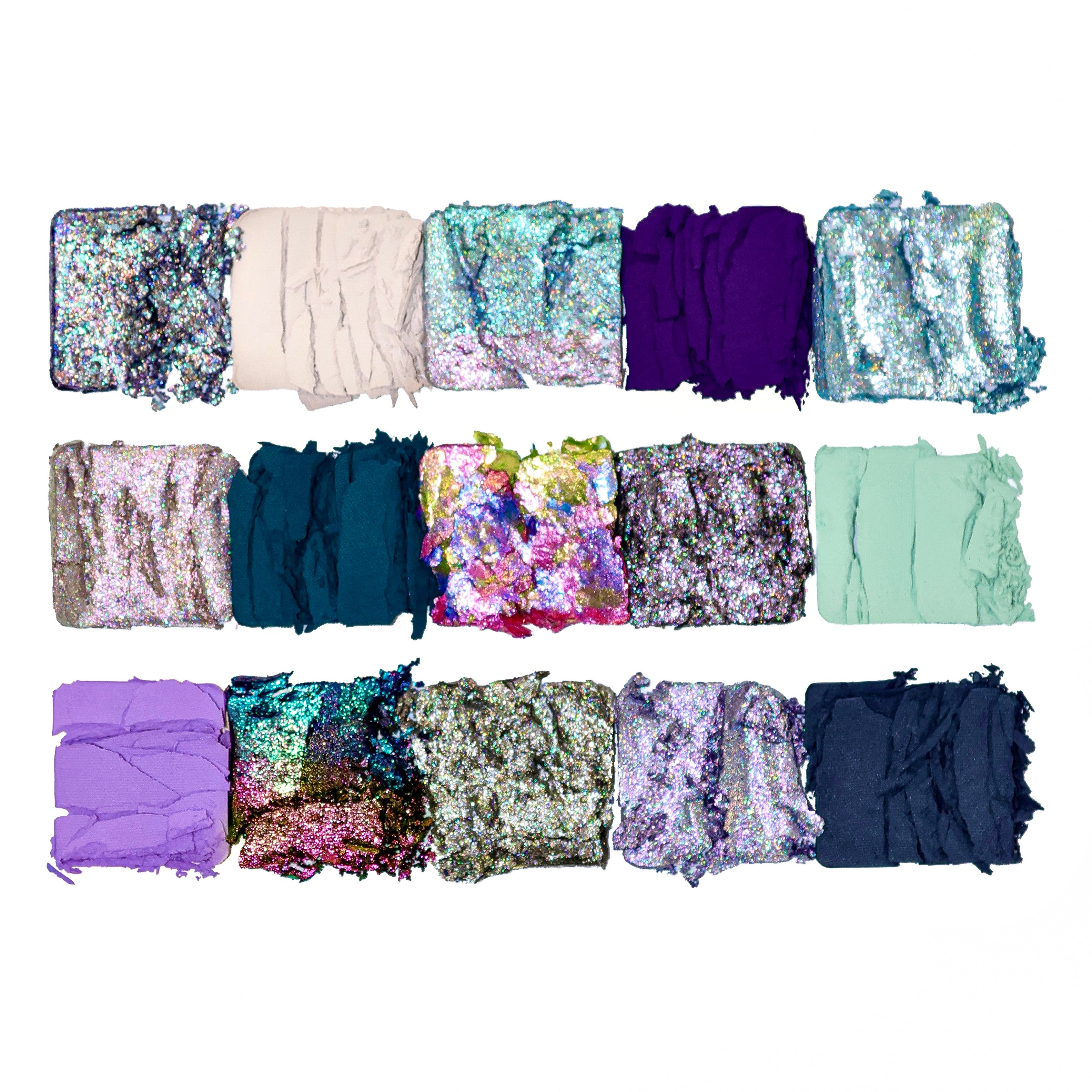 Collection of colorful sequin eyeshadows by Adept  on a white background