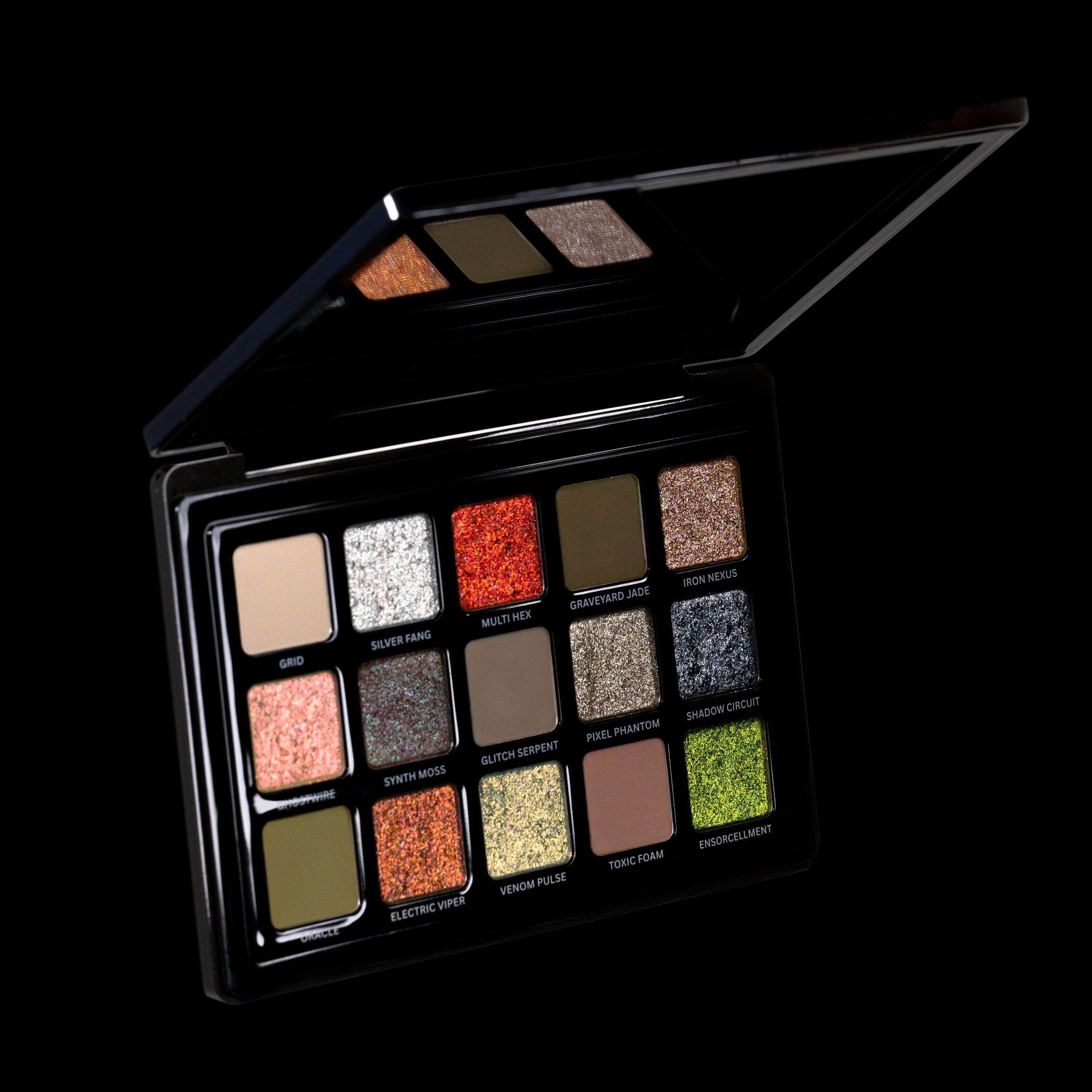 Makeup palette with various colors on a black background